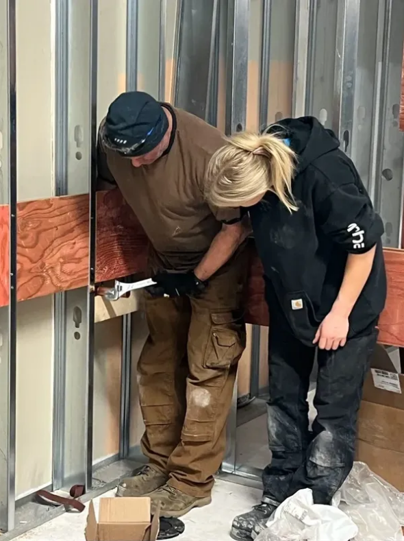 B. Gibson Mechanical crew working on commercial installation